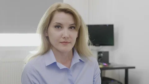Pleased and assertive corporate young woman in the office accepting offer sho Stock Footage 91584960