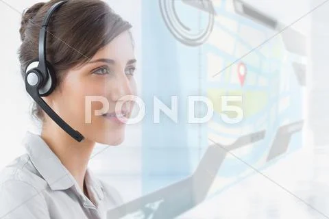 Pleased call center employee using futuristic street map interface Stock Photos