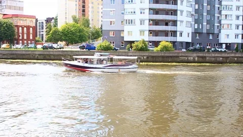 Pleasure boat floats on the river Stock Footage 80278326