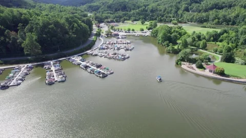 Pleasure boat returns to dock on Lake Lure in North Carolina Stock Footage 285322570