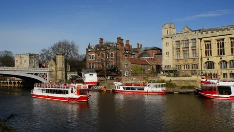 Pleasure boat on the river ouse by lendal bridge york uk Stock Footage