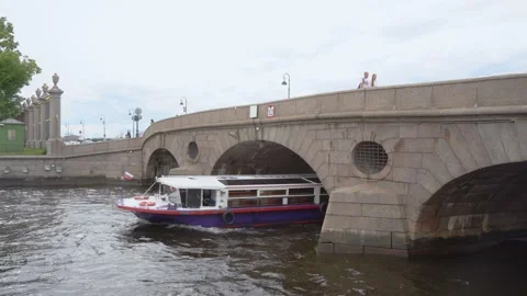 Pleasure boat under the Laundry Bridge on Fontanka River Stock Footage 277874099