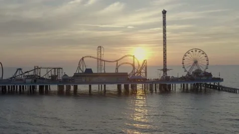 Pleasure Pier with a burning sunrise in the background Stock Footage 207196643