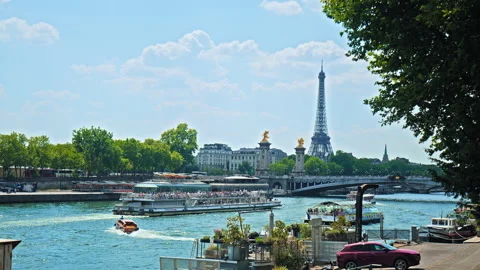 Pleasure ship sails on the river Seine with tourists on board. Stock Footage 245454990