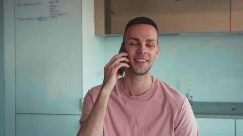 Pleasure talk. Close up portrait of young caucasian positive man talking on Stock Footage 241745575