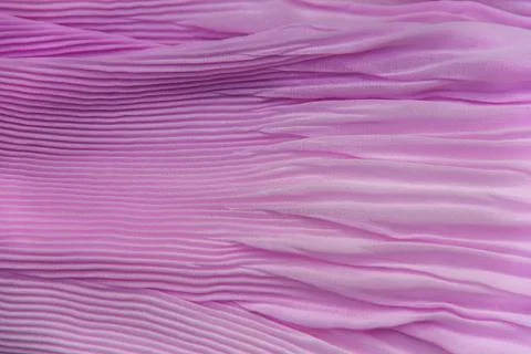 Pleated fabric background texture. pattern of fabric in the crease pattern fo Stock Photos