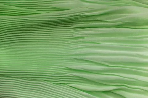 Pleated fabric background texture. pattern of fabric in the crease pattern fo Stock Photos