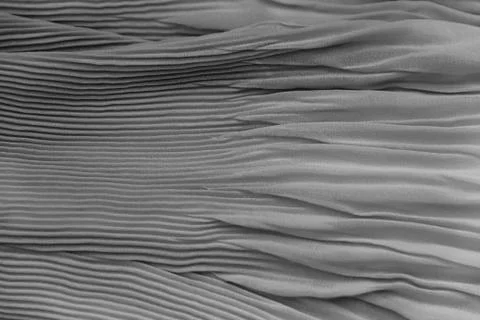 Pleated fabric background texture. pattern of fabric in the crease pattern fo Stock Photos