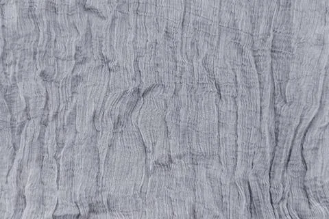 Pleated fabric background texture. pattern of fabric in the crease pattern fo Stock Photos
