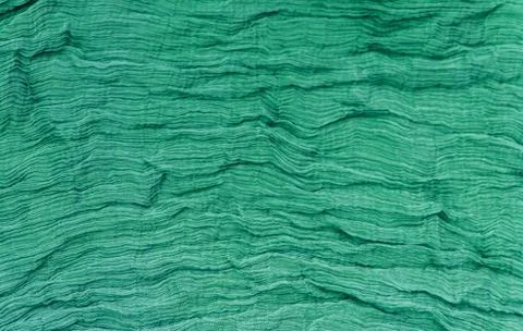 Pleated fabric background texture. pattern of fabric in the crease pattern fo Stock Photos