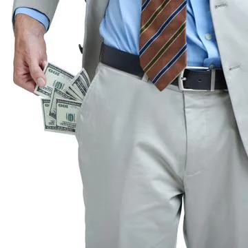 Plenty of cash to go around. Cropped shot a businessman showing you a pocket Stock Photos