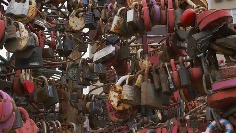 Plenty of locked up padlocks symbolizing an eternal love. Stock Footage 114497804