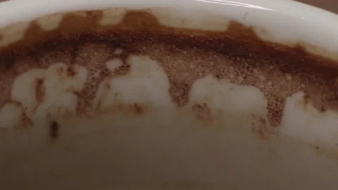 Plenty of sparkling coffee in a 360 degree rotating design cup Stock Footage 248565254