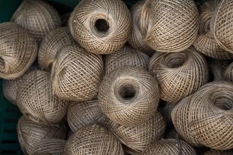Plenty of spools or rolls of brown color linen string Stock Photos