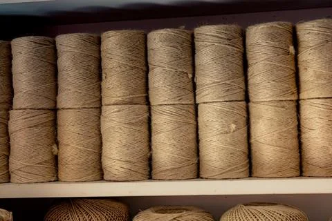 Plenty of spools or rolls of brown color linen string Stock Photos