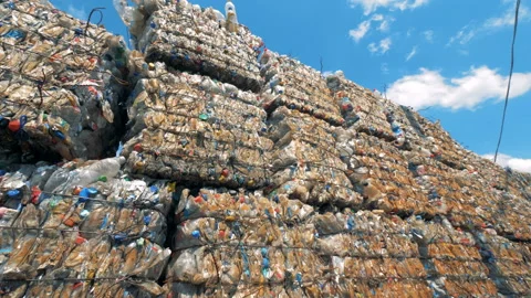 Plenty stacked trash blocks with plastic ready for further recycling. 스톡 동영상 93780396