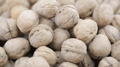 Plenty of walnuts on a table Stock Footage 58479885