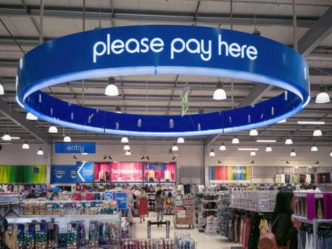 Plese Pay Here sign in Kmart Stock Photos