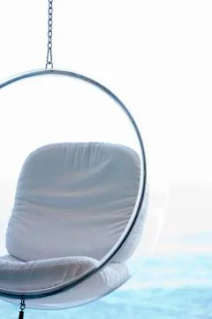 Plexiglas hanging chair Stock Photos