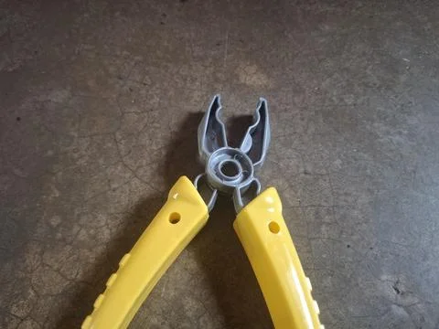 Pliers are versatile hand tools used for gripping Stock Photos