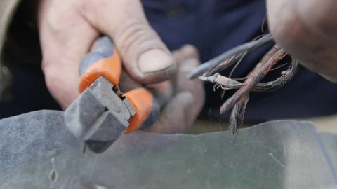 Pliers Have a Bite Wire. Macro Shooting Stock Footage 105264315