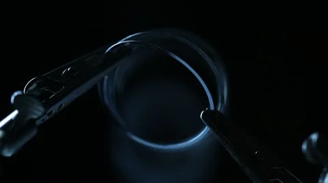 Pliers holding a spring Stock Footage 12342120