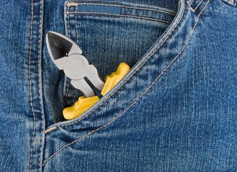 Pliers in a pocket Stock Photos