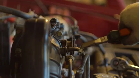 Pliers remove the retainer on the pipe. The engine of the car. Close-up 4K Stock Footage 122263553