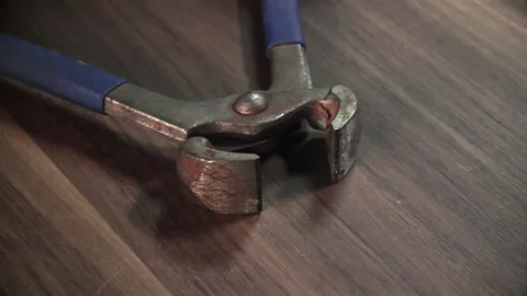 Pliers tool lying on table close up Stock Footage 196232246