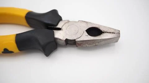Pliers on white background.Top angle view Photos