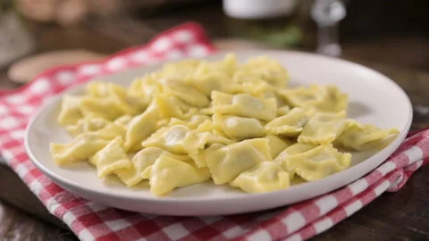 Plin del Piemonte. Small ravioli del plin typical Piedmontese filled pasta from Stock Footage 203969037