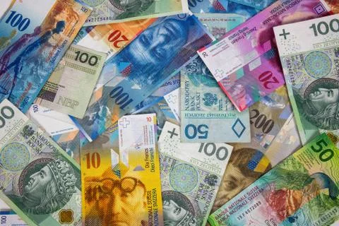 PLN and CHF banknotes as background Stock Photos