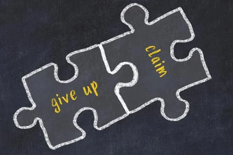 Ploblem solving. Chalk sketch of two puzzles with words give up and claim on  Stock Photos