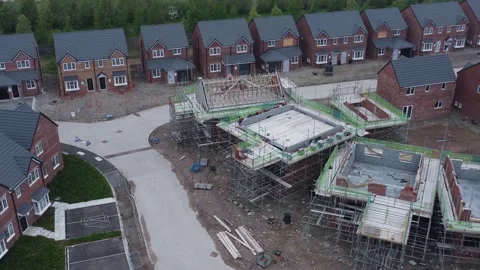 Plot development subdivision incomplete neighbourhood housing construction Stock Footage 189855549