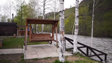 Plot on the edge of the river Vídeos de archivo 104410347