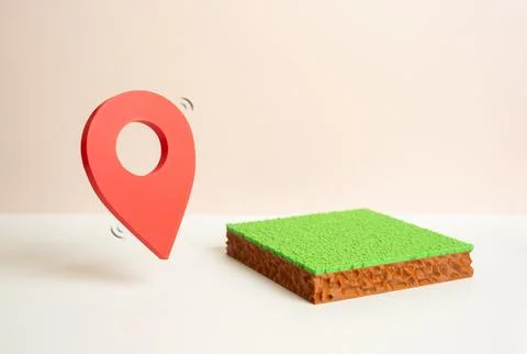A plot of land and a red geolocation symbol. Mapping plot boundaries, surve.. 스톡 사진
