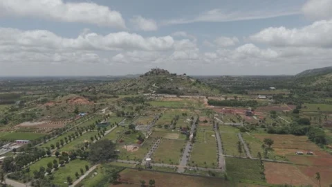 Plots sorrounderd with mountains Stock Footage 320317210