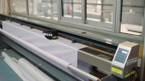 Plotter inkjet machine in Sialkot factory, Pakistan. Left slow motion interior Video stock 332205700