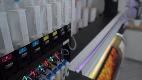 Plotter printing. Printing services and printing. The plotter prints the image. Stock Footage 257685767