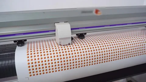 Plotter prints image on arakal. Plotter prints stickers. Stock Footage 288218285