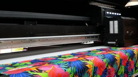 The plotter prints on a textile fabric. Stock Footage 190448294