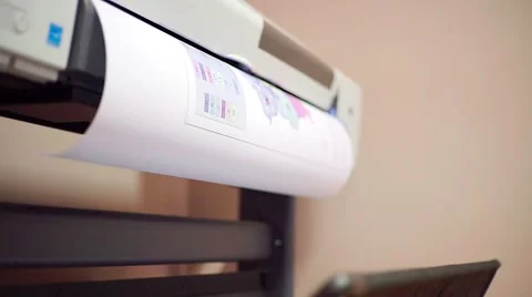 Plotting large formats. At the office. Architectural drawing. Dolly shot Stock Footage 68329013