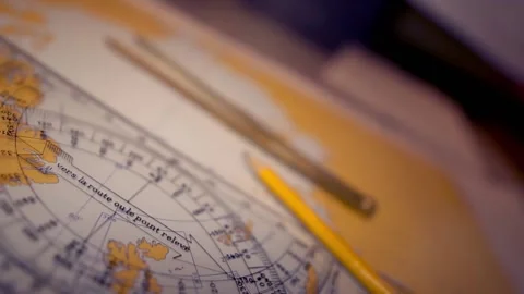 Plotting position on navigational chart at sea. Marine Map and ruler Stock Footage 134636126