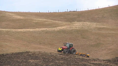 Ploughing a hillside Stock Footage 40289275