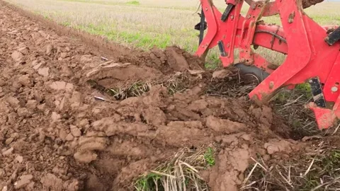 Ploughing Wheat Stubble UK Stock Footage 142808857