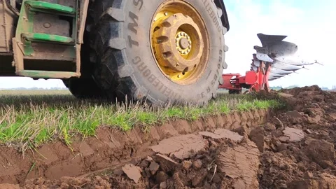 Ploughing Wheat Stubble UK Stock Footage 142808976