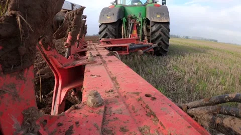 Ploughing Wheat Stubble UK Stock Footage 142809021