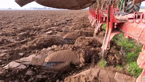 Ploughing Wheat Stubble UK Stock Footage 142809029