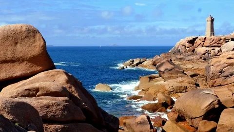 Ploumanach, coast with lighthouse in the background Video stock 77831478