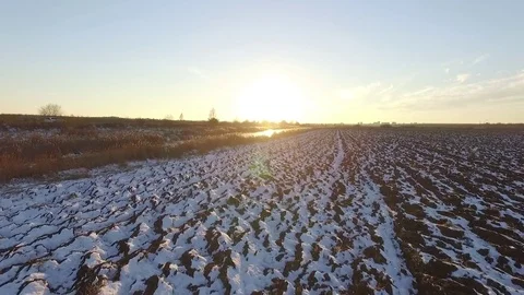 Plow a field in snow Stock-Footage 69980780